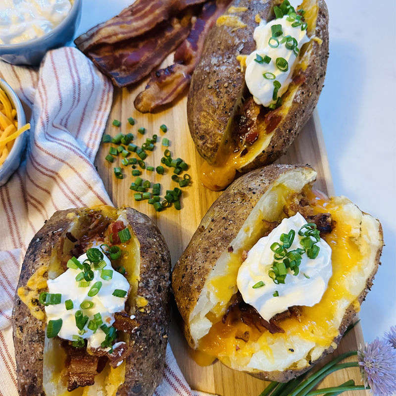 Loaded Baked Potatoes with Bacon and Cheddar