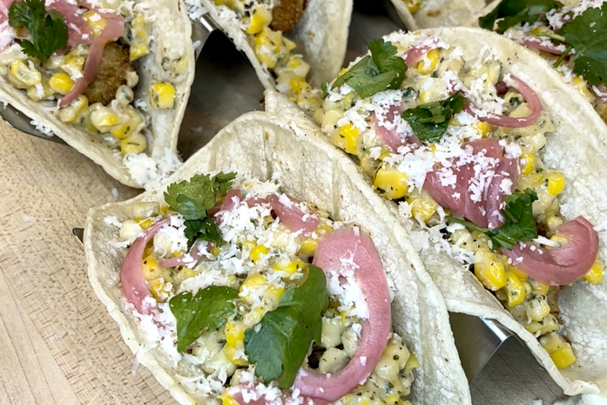 Fish Tacos with Elote and Pickled Red Onions
