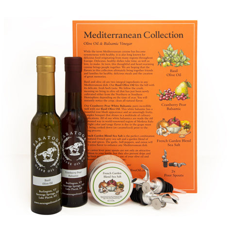 mediterranean collection of olive oil and balsamic and sea salt and pour spouts with a view of the back of the box and all the products laid out in front of the box